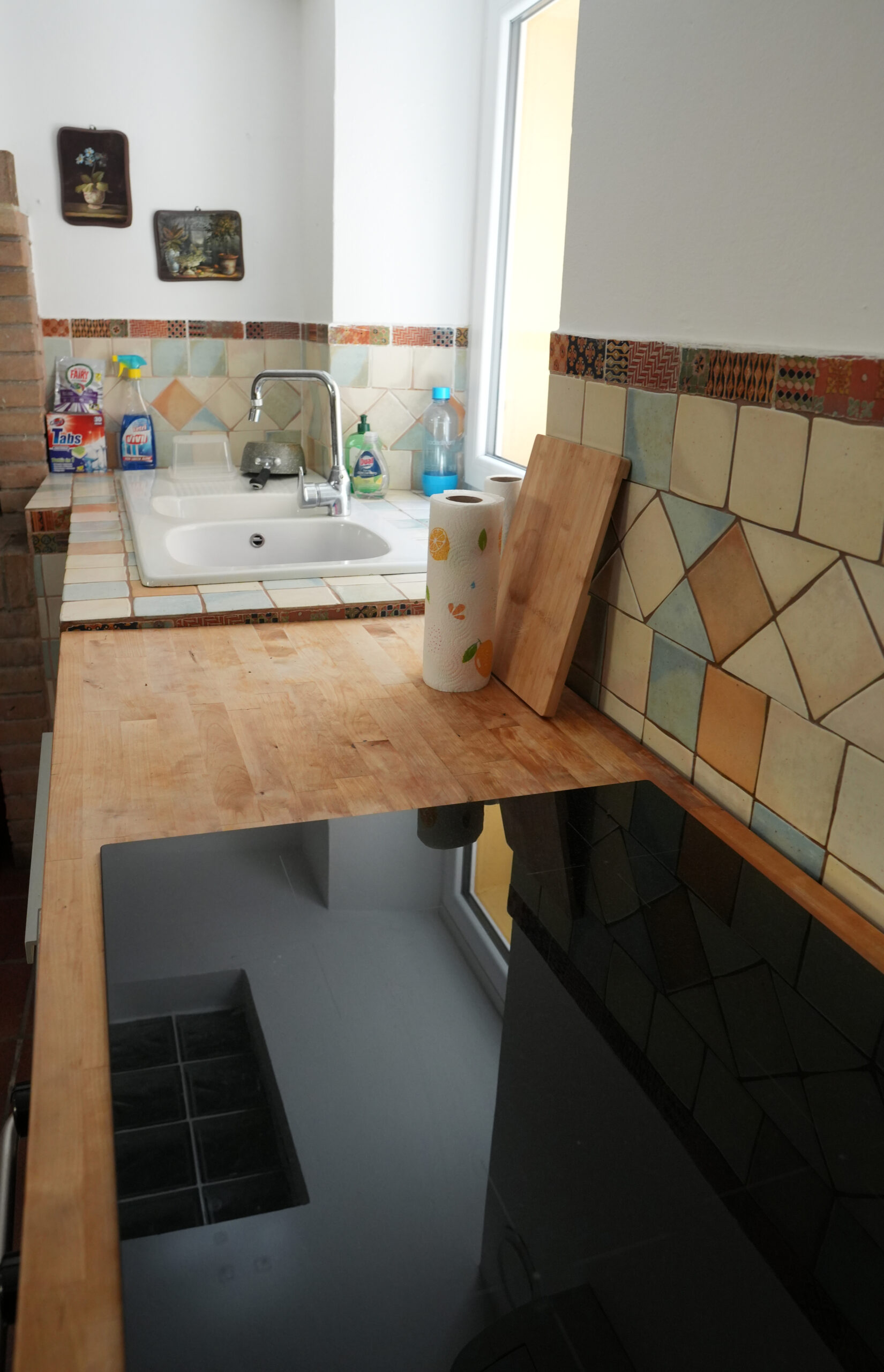Cucina, lavello e piano di lavoro